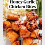 screen shot of idea pin for honey garlic chicken bites shown on a plate