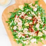 tuna white bean salad served on a wooden board