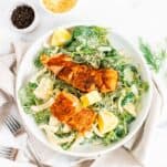 top down shot of a salmon Ceasar salad