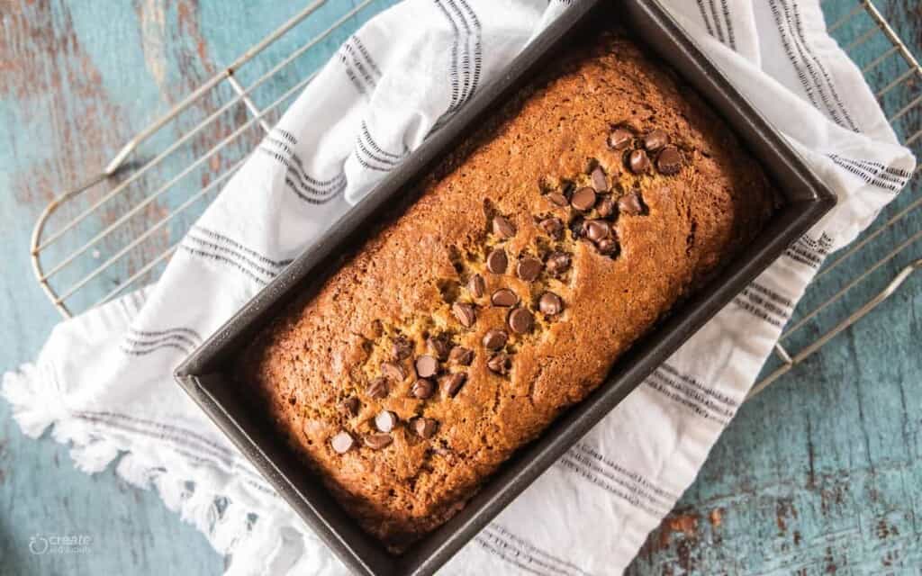 Whole Wheat Chocolate Chip Banana Bread shown in a baking pan