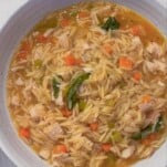 chicken orzo soup in a bowl