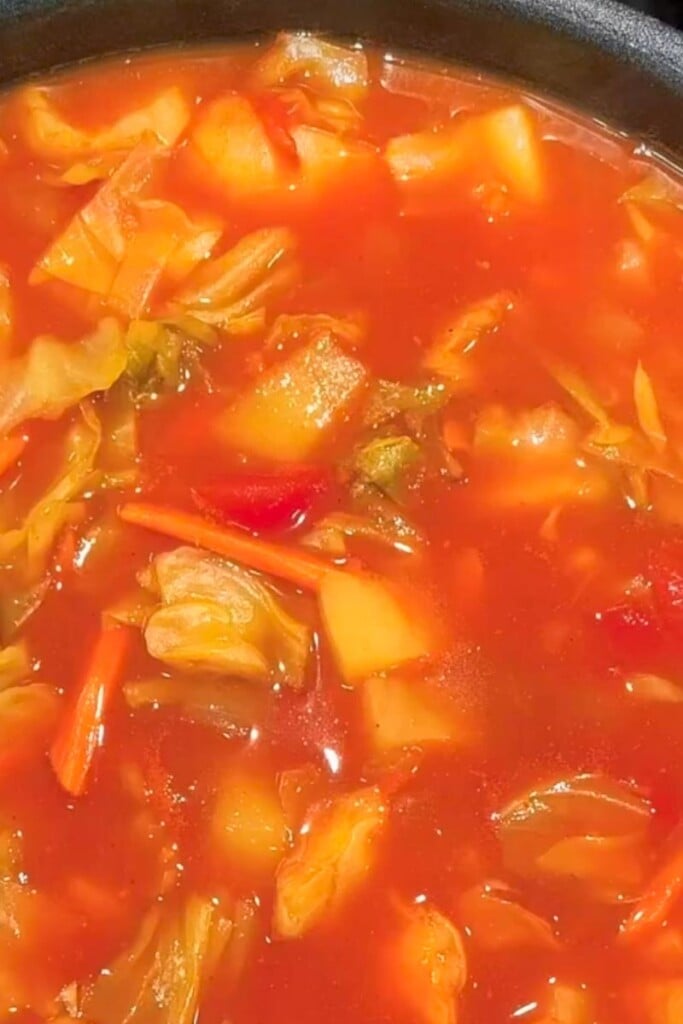 beef and cabbage soup in a pot